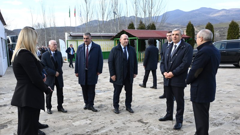 Coordination Headquarters members view sunflower oil plant in Girmizi Bazar settlement